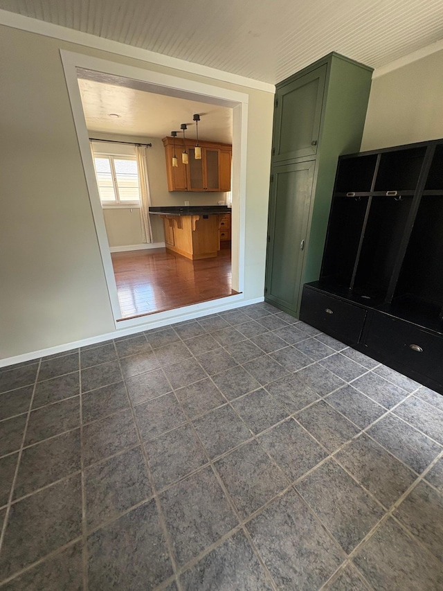 207 Meadow Ln, Benson, MN 56215 - kitchen with dark countertops, decorative light fixtures, and dark tile patterned flooring