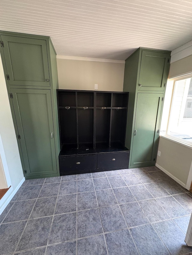 207 Meadow Ln, Benson, MN 56215 - mudroom with dark tile patterned floors and crown molding