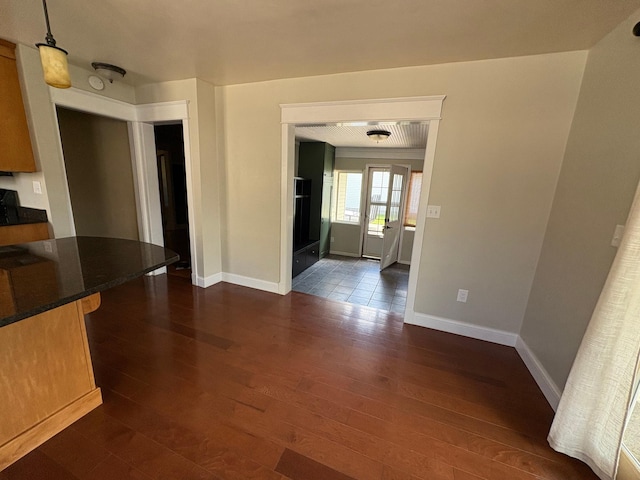 207 Meadow Ln, Benson, MN 56215 - unfurnished dining area with dark wood finished floors