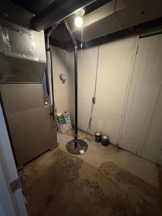 207 Meadow Ln, Benson, MN 56215 - unfinished below grade area featuring heating unit
