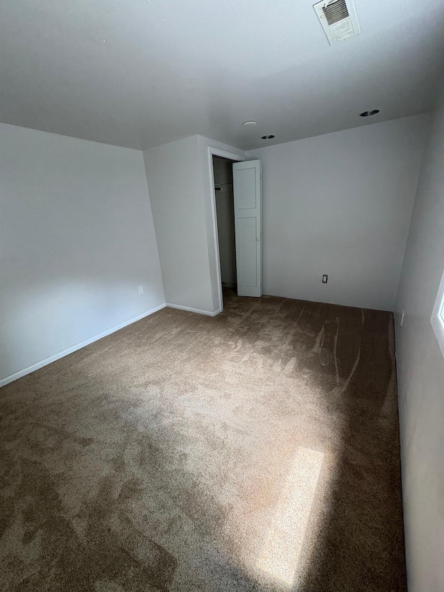 207 Meadow Ln, Benson, MN 56215 - unfurnished bedroom with carpet floors