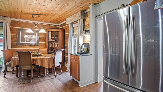 W13263 Hutchinson Rd, Big Bend Twp, WI 54819 - dining room with wood finished floors, wooden ceiling, and crown molding