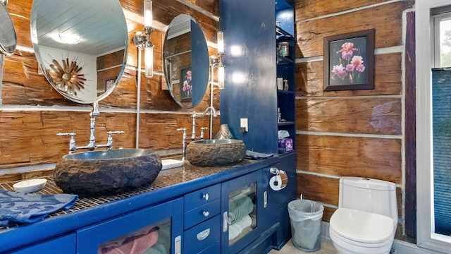 W13263 Hutchinson Rd, Big Bend Twp, WI 54819 - full bath with wooden walls and double vanity