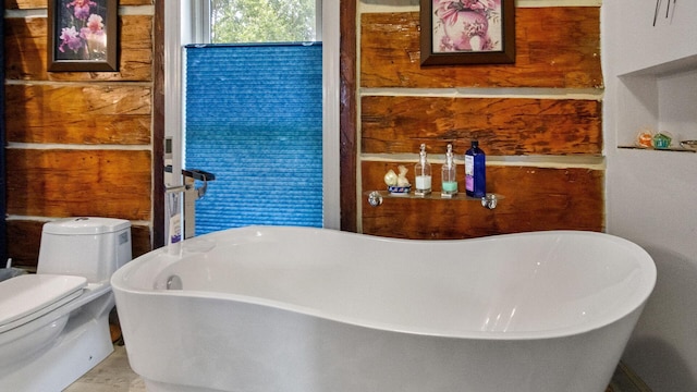 W13263 Hutchinson Rd, Big Bend Twp, WI 54819 - full bath with a freestanding tub and toilet