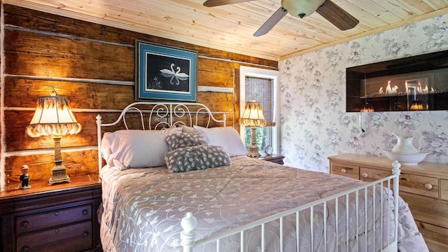 W13263 Hutchinson Rd, Big Bend Twp, WI 54819 - bedroom featuring wood ceiling, wallpapered walls, and crown molding