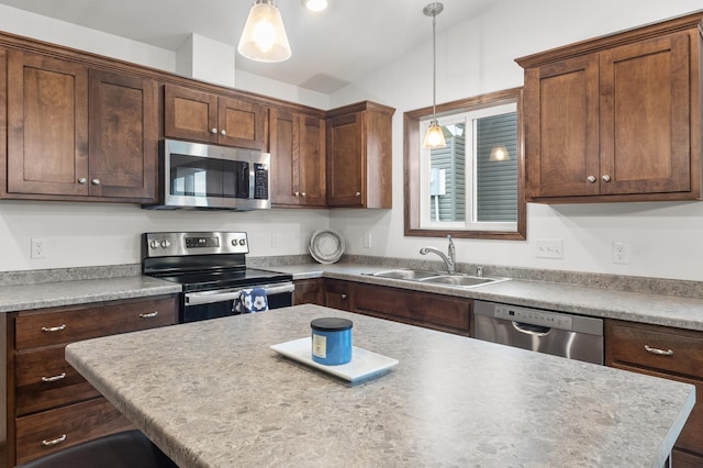 888 Tallgrass Ct, Wanamingo, MN 55983 - kitchen featuring appliances with stainless steel finishes, pendant lighting, and light countertops