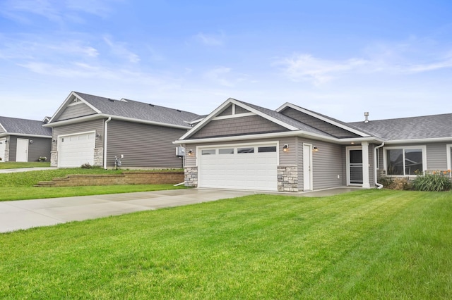 888 Tallgrass Ct, Wanamingo, MN 55983 - craftsman-style house featuring an attached garage, stone siding, driveway, a front lawn, and a shingled roof