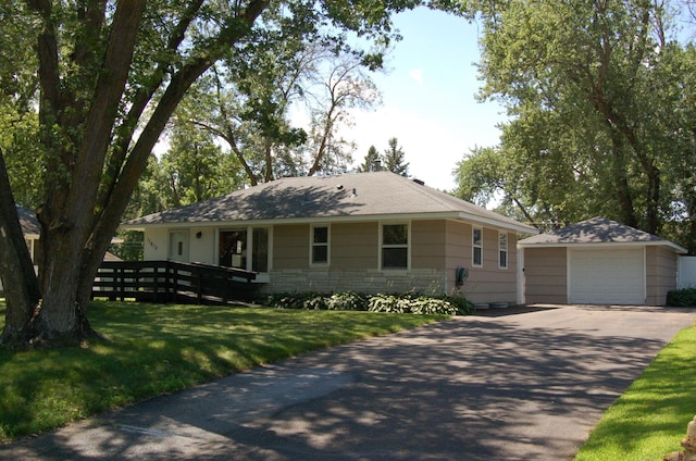11610 Norway St NW, Coon Rapids, MN 55448 - ranch-style home featuring a detached garage, driveway, an outdoor structure, and a front lawn