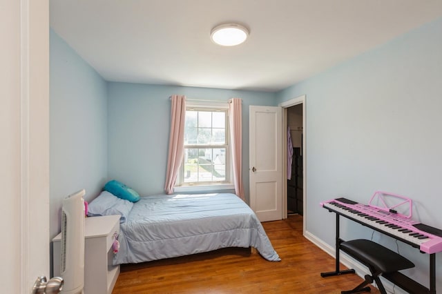 1290 Matilda St, Saint Paul, MN 55117 - bedroom featuring wood finished floors and baseboards