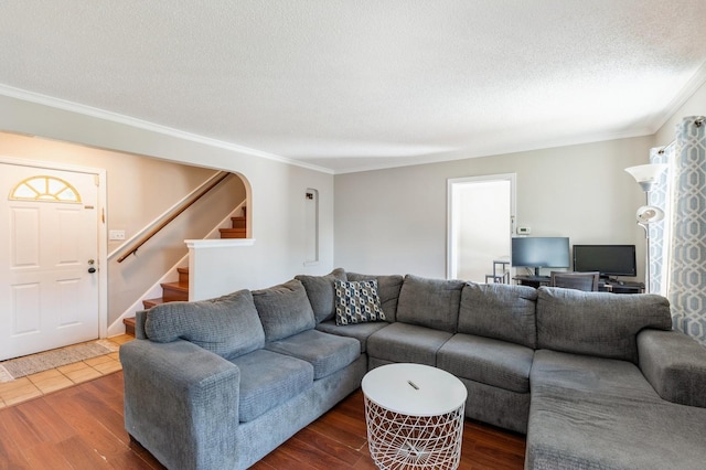 1290 Matilda St, Saint Paul, MN 55117 - living room with ornamental molding, stairway, a textured ceiling, and wood finished floors