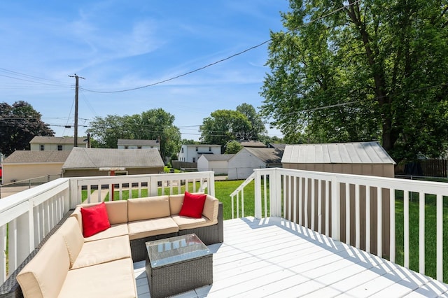 1290 Matilda St, Saint Paul, MN 55117 - wooden terrace featuring an outdoor living space and an outbuilding