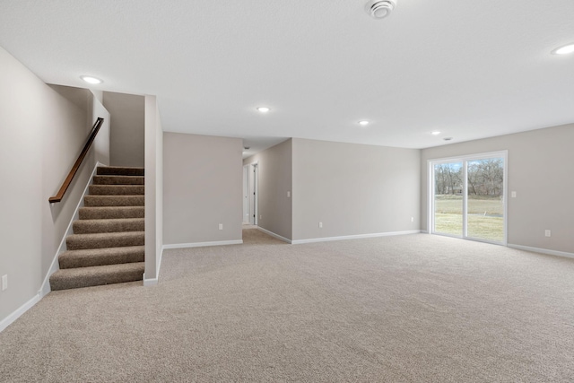 2556 Buffalo Ridge Dr, Buffalo, MN 55313 - unfurnished living room with carpet flooring, stairway, and recessed lighting