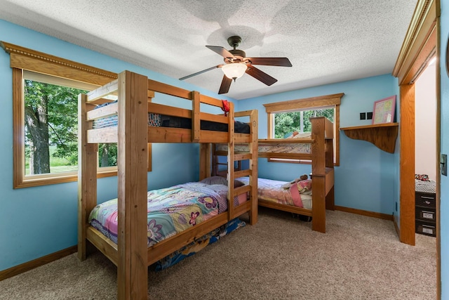 4508 192nd St, Fair Haven Twp, MN 55382 - carpeted bedroom with a textured ceiling and a ceiling fan