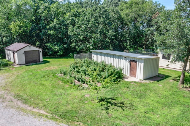 4508 192nd St, Fair Haven Twp, MN 55382 - view of yard featuring a storage unit and a detached garage