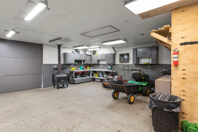 4508 192nd St, Fair Haven Twp, MN 55382 - garage with a wood stove