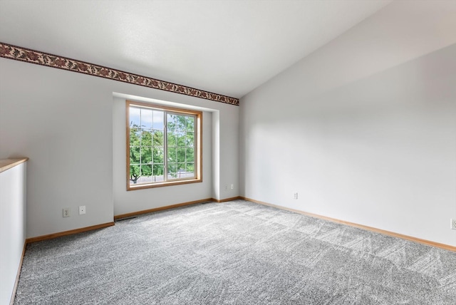 6617 378th St, North Branch, MN 55056 - carpeted spare room featuring baseboards and lofted ceiling