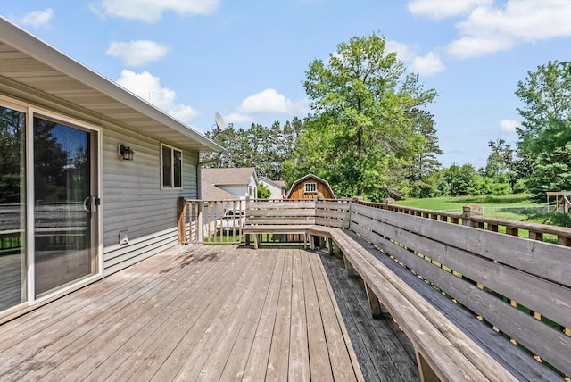 6617 378th St, North Branch, MN 55056 - wooden deck with view of scattered trees