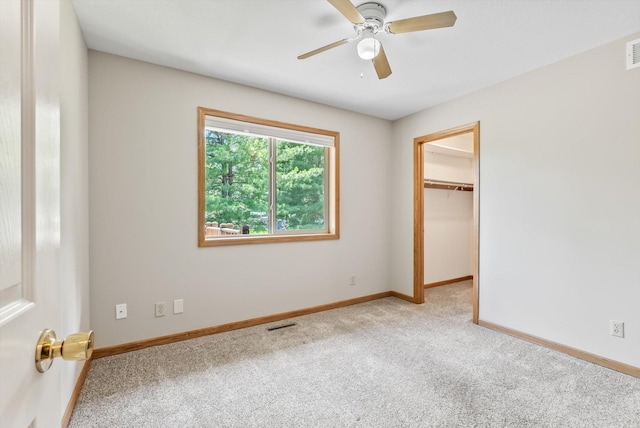 6617 378th St, North Branch, MN 55056 - unfurnished bedroom with carpet floors, a spacious closet, and ceiling fan