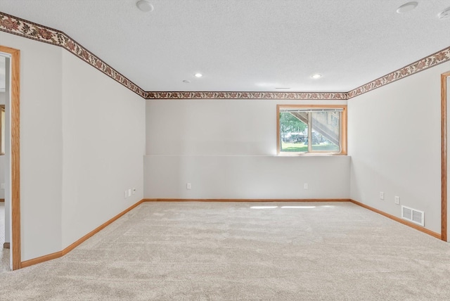 6617 378th St, North Branch, MN 55056 - empty room with carpet floors, a textured ceiling, and recessed lighting