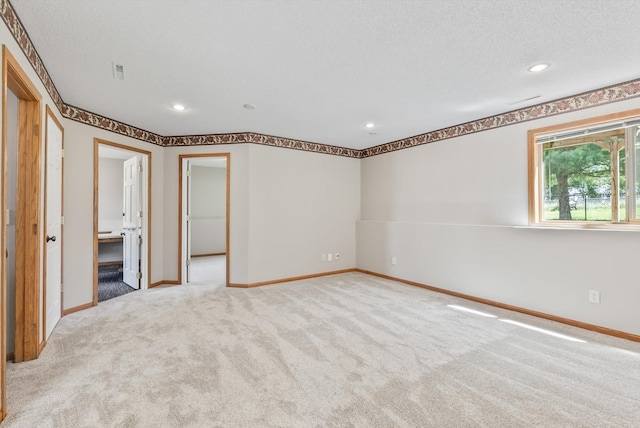 6617 378th St, North Branch, MN 55056 - carpeted empty room with recessed lighting and a textured ceiling