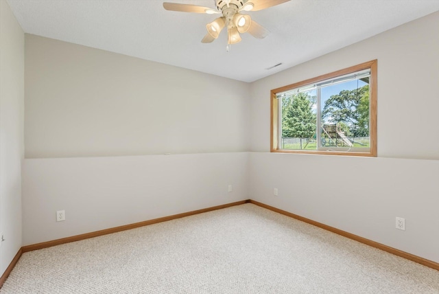 6617 378th St, North Branch, MN 55056 - carpeted spare room with baseboards and ceiling fan