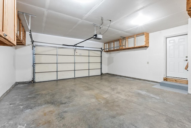 6617 378th St, North Branch, MN 55056 - garage with a garage door opener and baseboards