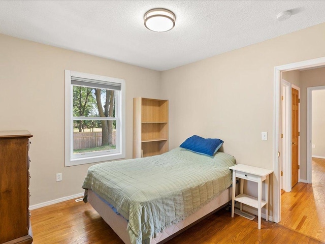 7247 Eden Prairie Rd, Eden Prairie, MN 55346 - bedroom with wood finished floors and baseboards