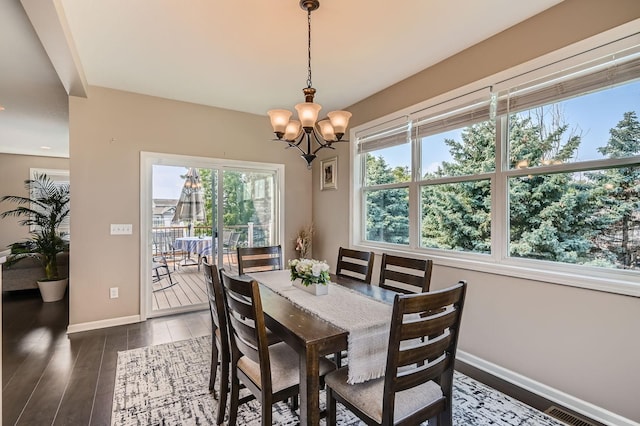 1535 138th St E, Rosemount, MN 55068 - dining space with a chandelier and wood finished floors