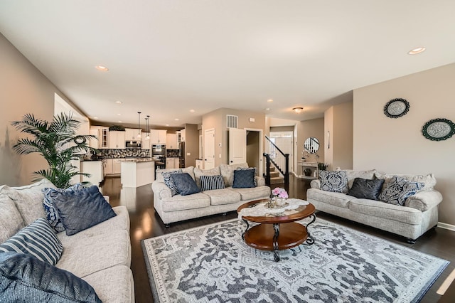 1535 138th St E, Rosemount, MN 55068 - living area featuring dark wood-type flooring, recessed lighting, and stairway
