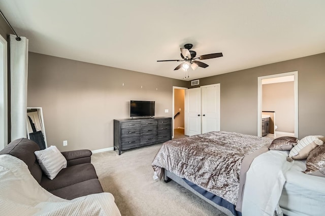 1535 138th St E, Rosemount, MN 55068 - bedroom with light carpet, a closet, a ceiling fan, and ensuite bath