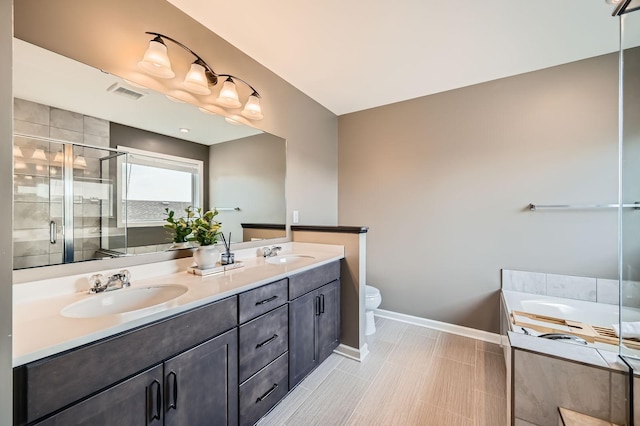 1535 138th St E, Rosemount, MN 55068 - bathroom with double vanity, a garden tub, and a stall shower