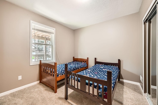 1535 138th St E, Rosemount, MN 55068 - carpeted bedroom featuring baseboards and a textured ceiling