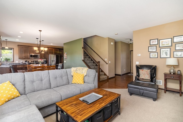 3410 Boulder Trl, Webster, MN 55088 - living area featuring stairs, recessed lighting, and light carpet