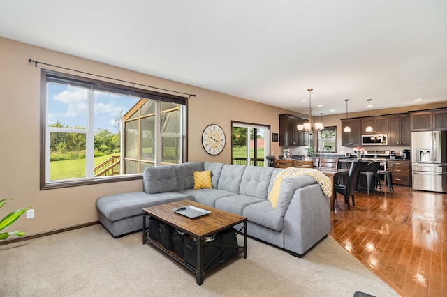 3410 Boulder Trl, Webster, MN 55088 - living area with a chandelier, recessed lighting, and light wood-style floors