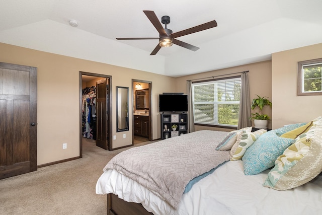 3410 Boulder Trl, Webster, MN 55088 - bedroom featuring light colored carpet, a walk in closet, ensuite bath, ceiling fan, and a closet