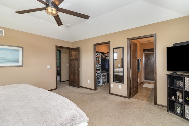 3410 Boulder Trl, Webster, MN 55088 - bedroom featuring light colored carpet, a spacious closet, ensuite bath, a closet, and a ceiling fan
