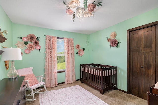 3410 Boulder Trl, Webster, MN 55088 - bedroom with light carpet and a nursery area