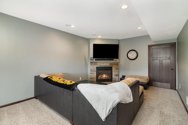 3410 Boulder Trl, Webster, MN 55088 - living room with light colored carpet, recessed lighting, and a fireplace