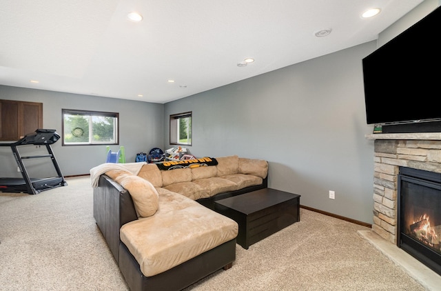 3410 Boulder Trl, Webster, MN 55088 - living area with light carpet, recessed lighting, and a stone fireplace