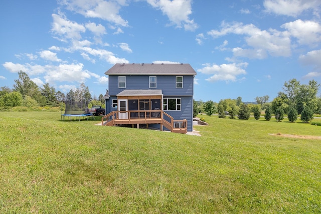 3410 Boulder Trl, Webster, MN 55088 - rear view of property featuring a trampoline, a sunroom, and a yard