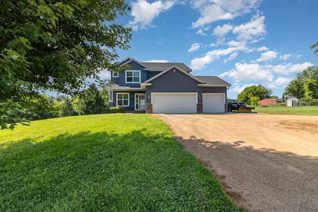 3410 Boulder Trl, Webster, MN 55088 - craftsman-style home featuring driveway, an attached garage, and a front yard