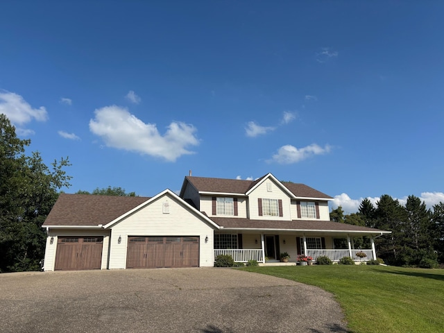 22973 Woodland Rd, New Market Twp, MN 55044 - view of front facade featuring a porch, driveway, an attached garage, a front lawn, and a shingled roof