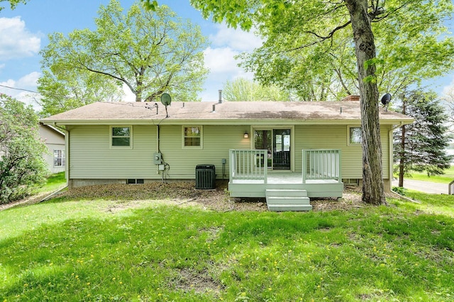 8112 Shore Trl N, Forest Lake, MN 55025 - rear view of house with a wooden deck and a yard