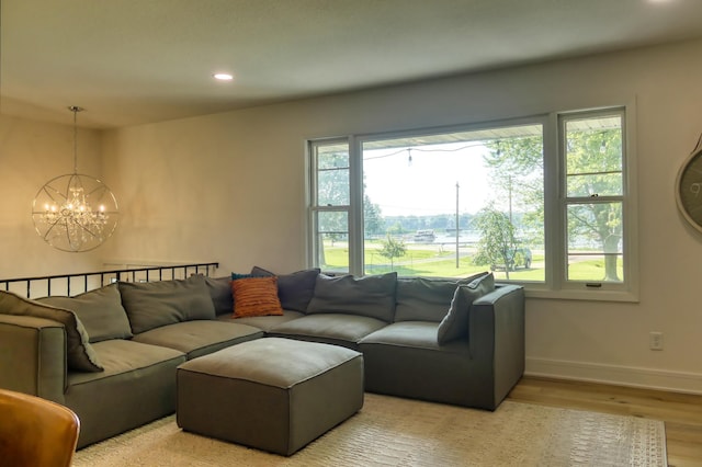 8112 Shore Trl N, Forest Lake, MN 55025 - living room featuring a chandelier, wood finished floors, and recessed lighting