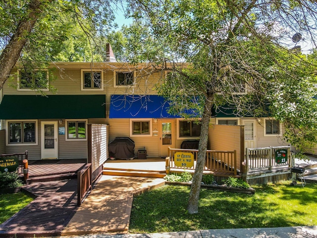 14590 Gazebo Dr Unit 10, Park Rapids, MN 56470 - view of front of home featuring a wooden deck and a front yard