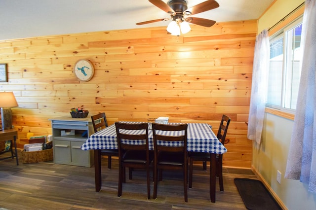 14590 Gazebo Dr Unit 10, Park Rapids, MN 56470 - dining space with dark wood finished floors, wood walls, and a ceiling fan