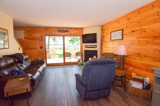 14590 Gazebo Dr Unit 10, Park Rapids, MN 56470 - living room featuring wooden walls, a fireplace, and wood finished floors