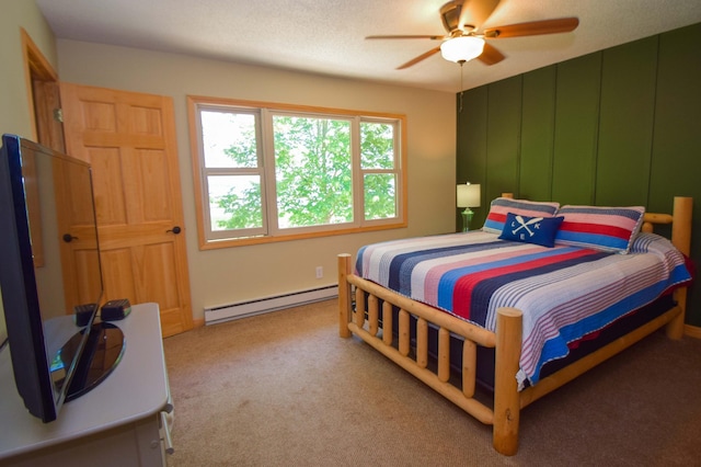14590 Gazebo Dr Unit 10, Park Rapids, MN 56470 - carpeted bedroom with a baseboard radiator and a ceiling fan