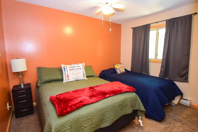 14590 Gazebo Dr Unit 10, Park Rapids, MN 56470 - bedroom with a baseboard heating unit, carpet flooring, and ceiling fan