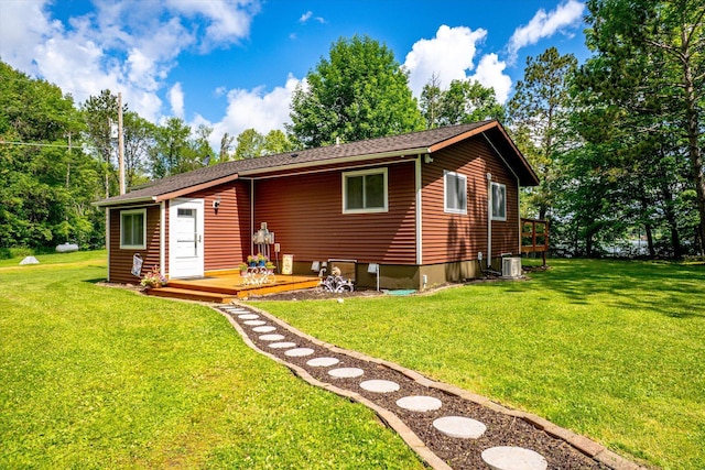 36977 Shoreland Rd, Sturgeon Lake, MN 55783 - rear view of house with a yard and a wooden deck